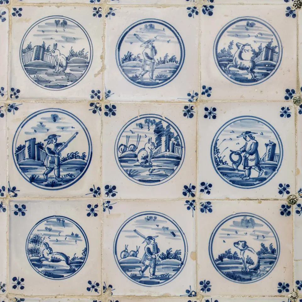 Faience tiles with hunting scenes